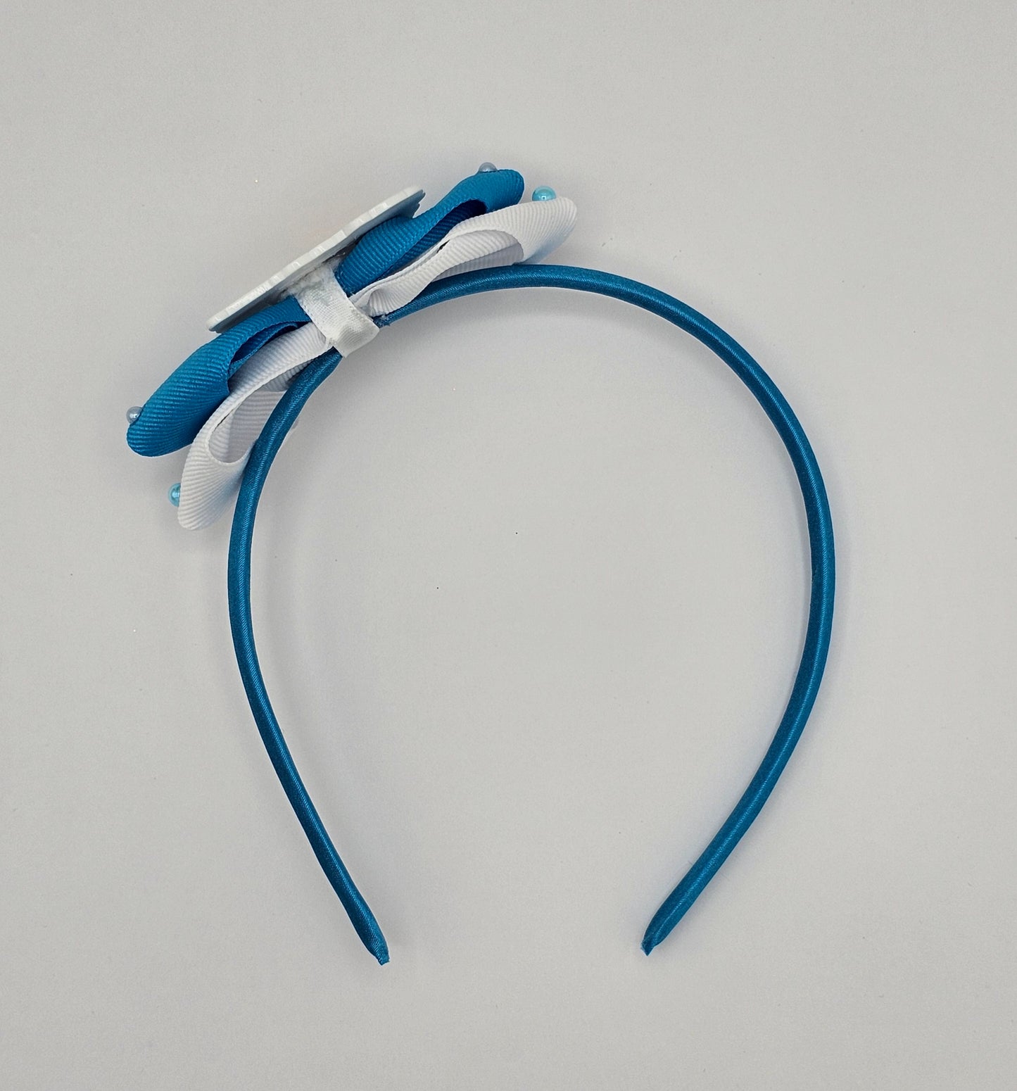 Delicate, Soft and Very Flexible headband.