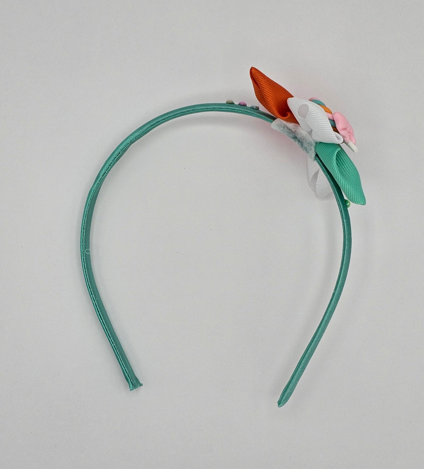 Delicate, Soft and Very Flexible headband.